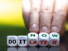 Estate Tax Changes Coming in 2026: What High-Net-Worth Individuals Must Do Now Hand placing blocks that spell 'DO IT LATER' with 'NOW' visible, conveying procrastination.